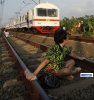 bvillagers_in_indonesia_have_resorted_to_lying_on_train_t_14.jpg